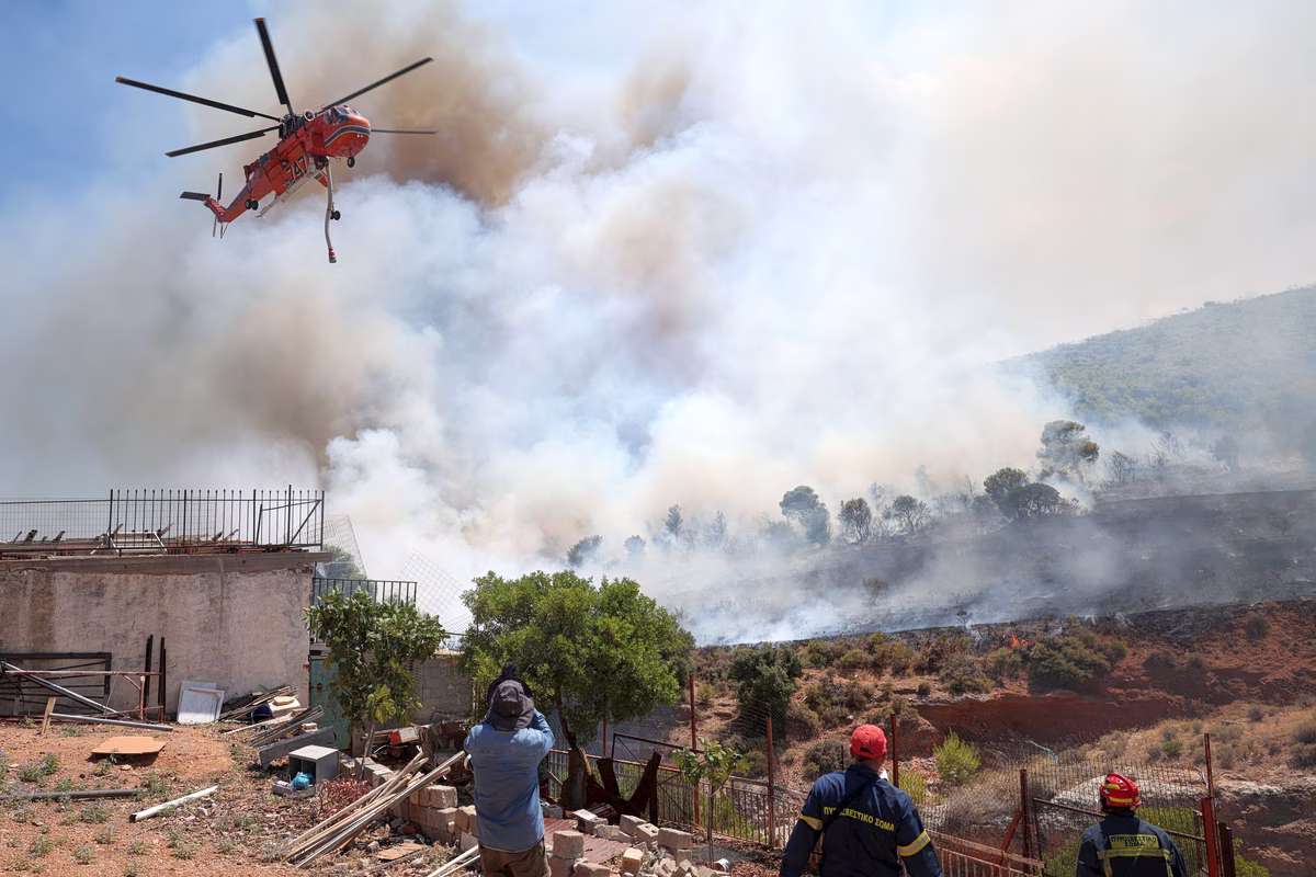 2026-08-03T154858Z_397751825_RC2ZQMACSUE3_RTRMADP_5_EUROPE-WEATHER-GREECE-WILDFIRES-1200x800.jpg